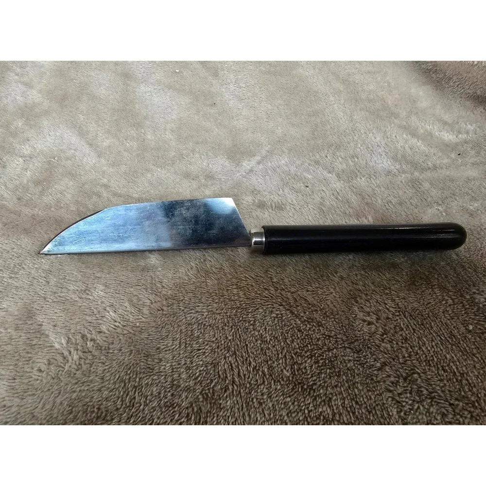 Pampered Chef V-Shaped Cutter, model #1160.